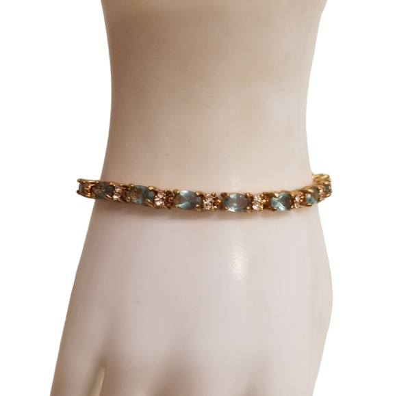AVON VINTAGE 2003 MARCH BIRTHSTONE AQUAMARINE GOLD TENNIS BRACELET - Picture 1 of 5